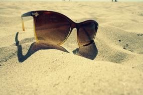 America Sunglasses on sand