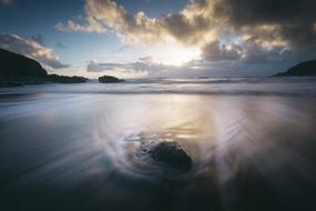 Ocean Waves Rock on beach