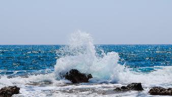 Sea Wave Smashing rocky beach