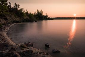 Sunset over water coast Landscape