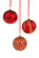 three red christmas Balls at white background