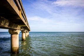 pier on concrete pillars over Sea