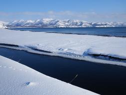 Ocean snow covered coast