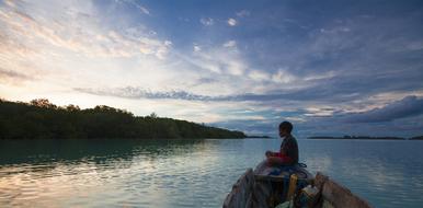 Boy Boat Widi Islands