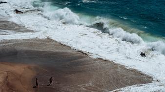 Big wave coming to the beach