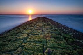 Sunset Sea Groyne island