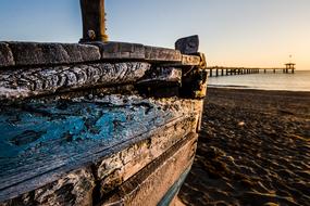 Old fishing Wooden Boat At Sunrise