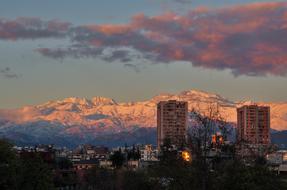 Snowy Mountains City Sunset