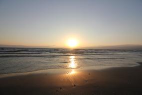 bright sun illuminating the surface of the water