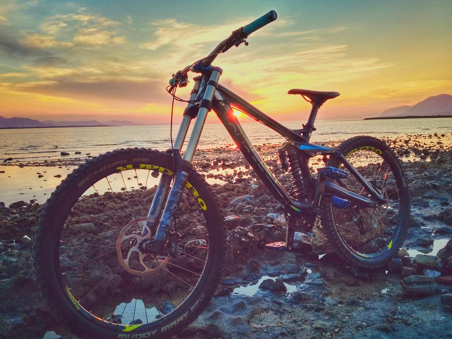 Bicycle standing on the beach