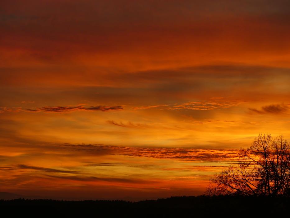 Cloudy sky against the background of sunset