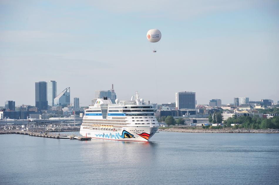 hot air balloon and cruise ship in port