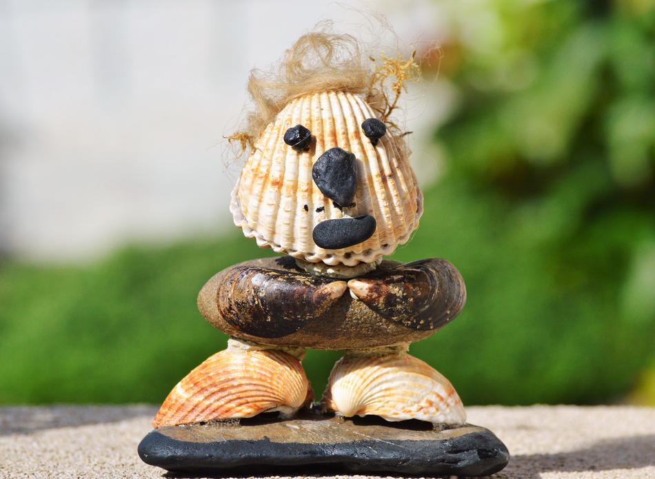 Human figurine made of seashells