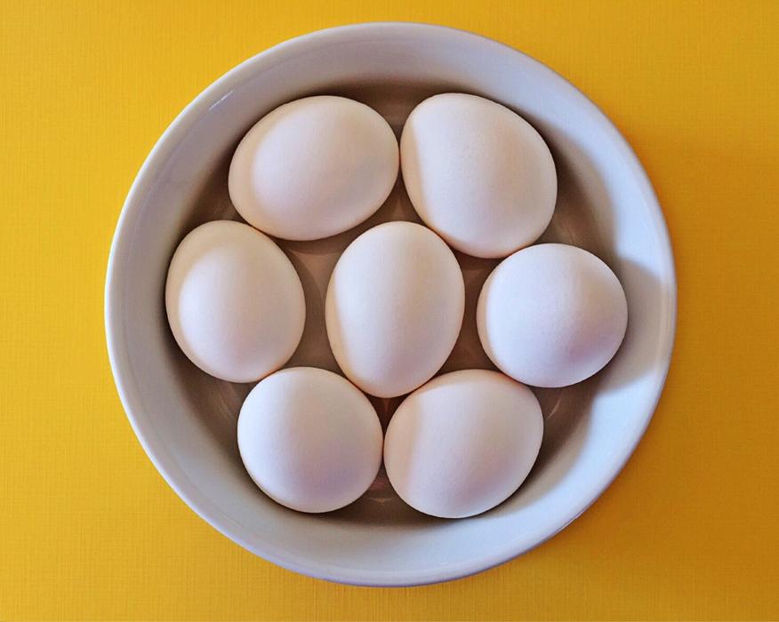 white Eggs in white Bowl