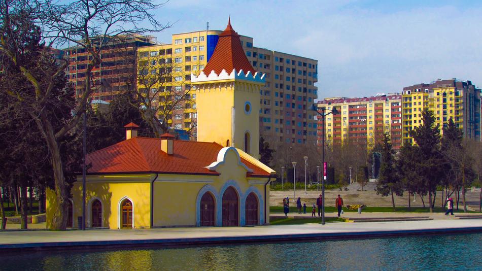 bright little building near the city pond