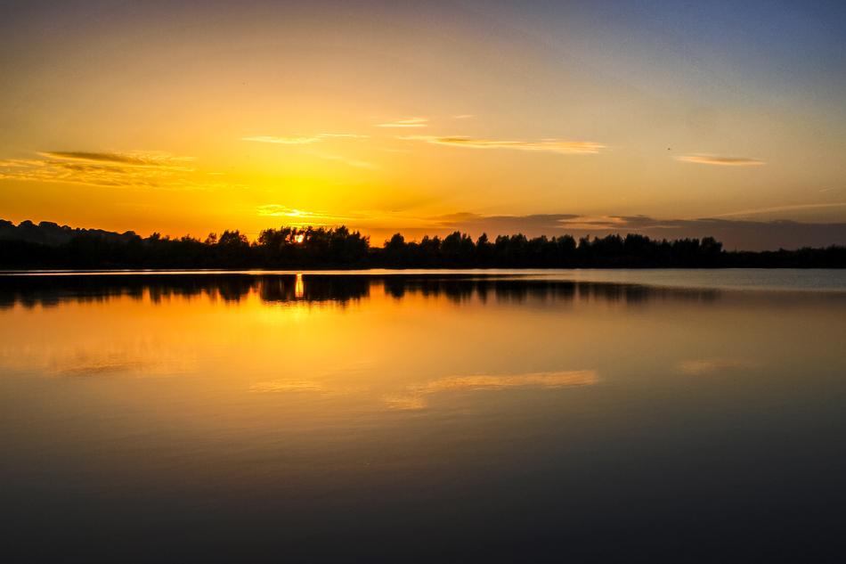 yellow evening glow over the pond
