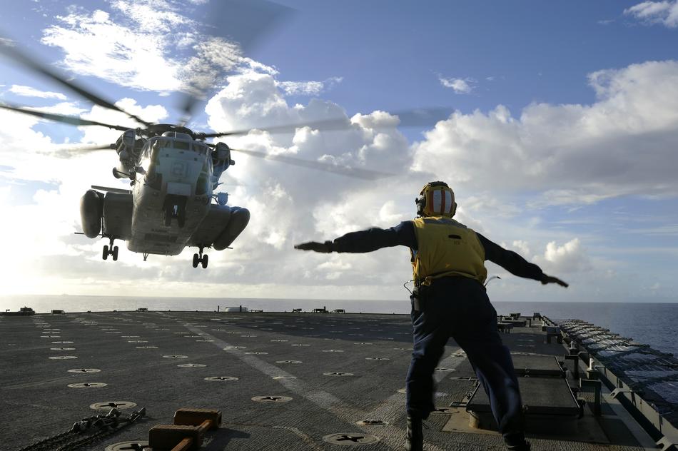 Sailor Directing Helicopter