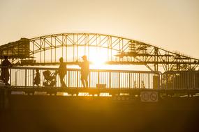 silhouette of a happy couple against the sunset