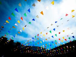 colored flags on a rope on the roof