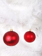 red balls on a white christmas tree