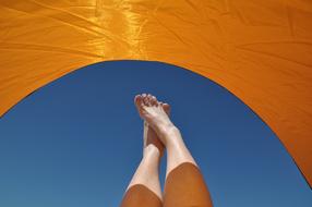 feet against the sky