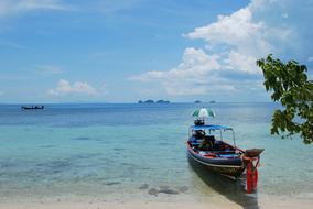 boat on a sandy ocean beach