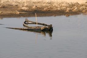 destroyed boat on the sea view