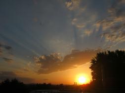 the sunset is beautiful in the sky