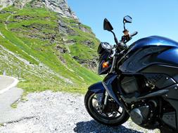 black motorcycle on top of the mountain