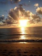 bright sun in the fluffy clouds