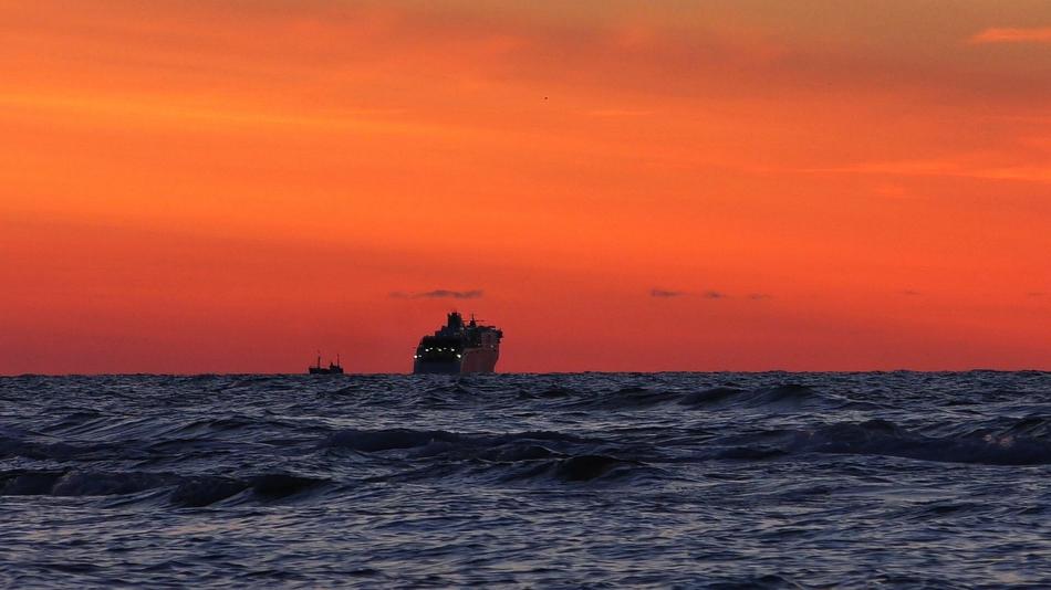 Resort ship in the sea against the background of the sunset