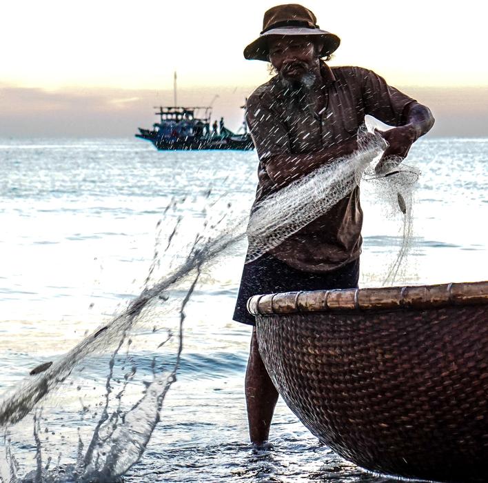 man with a fishing net