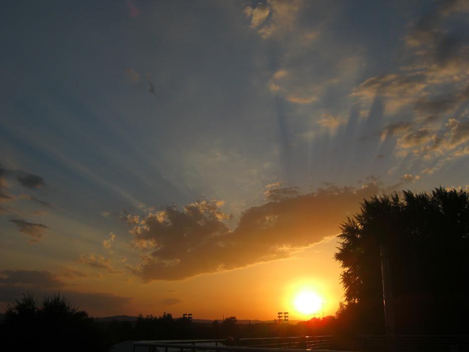 the sunset is beautiful in the sky