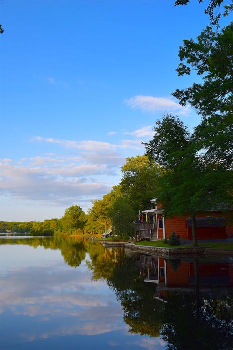 wooden cottage by the lake