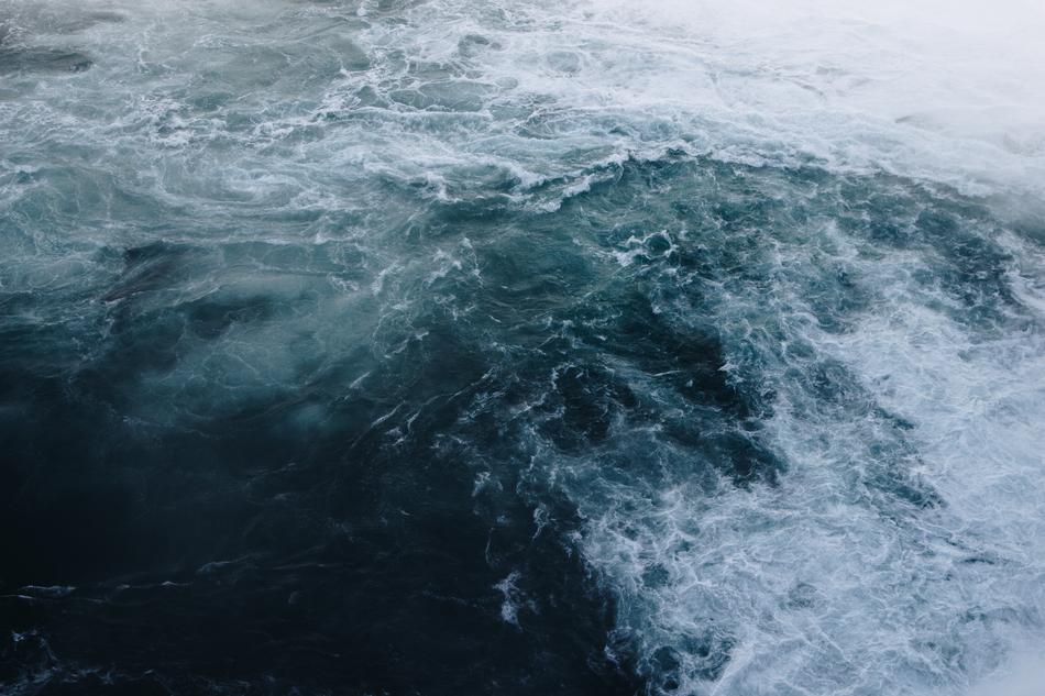 Sea waves crashing against each other