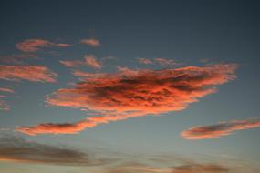 orange fluffy clouds in the sky