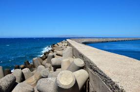 stone long fence by the sea