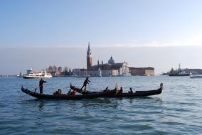 people floating on the river