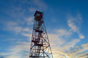tall radio tower against a beautiful sky