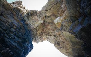 Stone arch against the sky