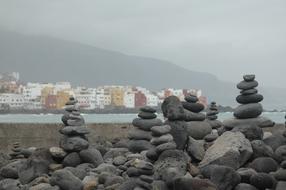 Zen towers made of stones on the beach