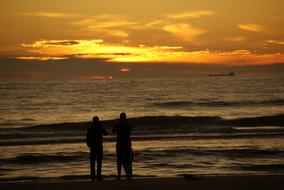 People watching the sunset