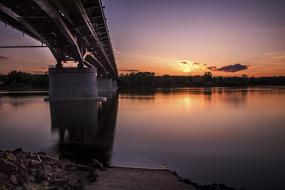 long bridge with the sunset as a backdrop