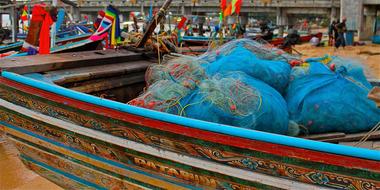 Colorful sets of anglers in a boat