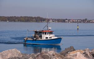 fish boat sea mountain