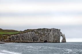 A rocky cliff in the sea