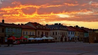 golden sunset sky over old town, poland, olkusz