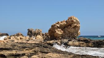 A large rock in the sea