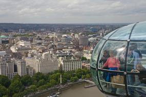 People in a transparent elevator