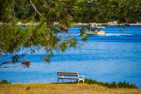 A lonely bench in the park overlooking the sea